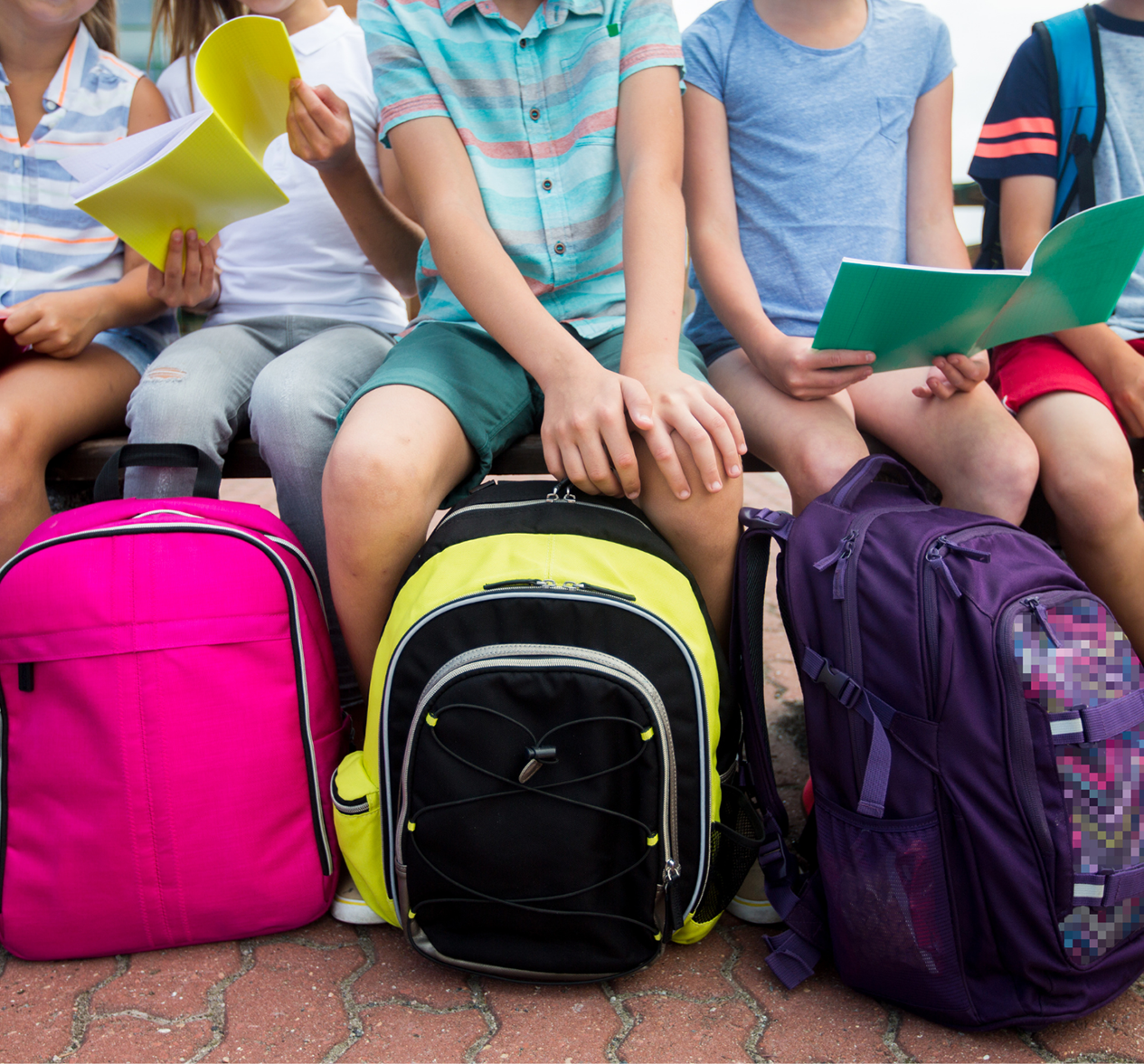 Kids with backpacks going back to school